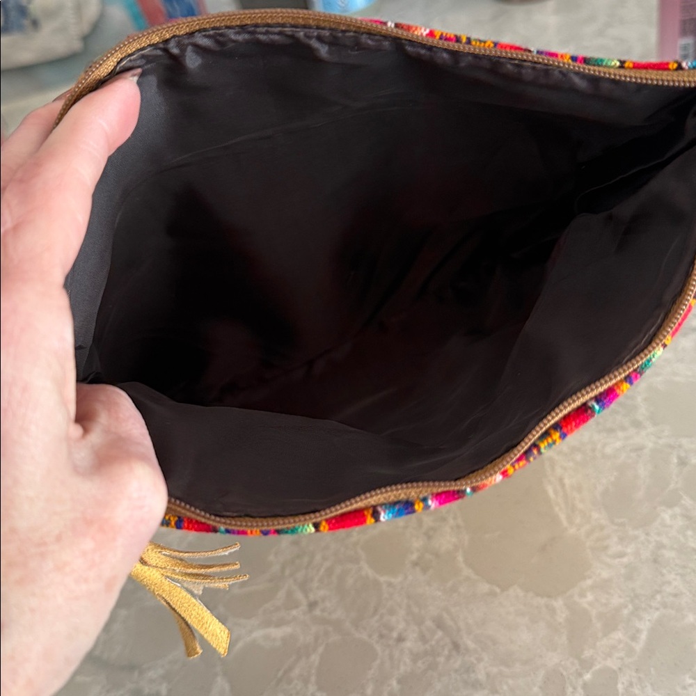 Peruvian foldover clutch bag with a colorful rainbow-striped - Picture 5 of 6